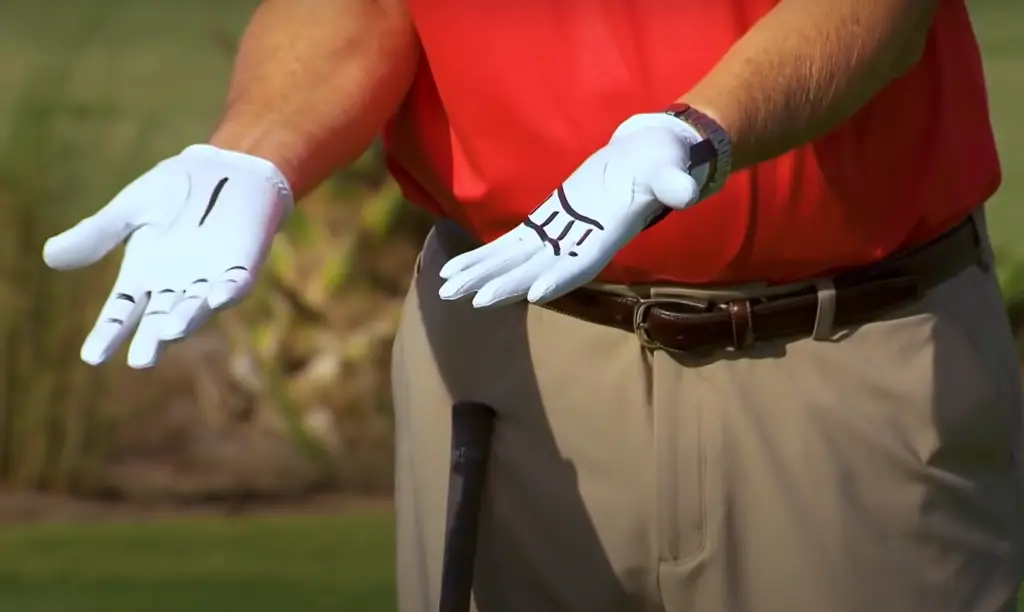 Why do pro golfers take their gloves off after every shot?